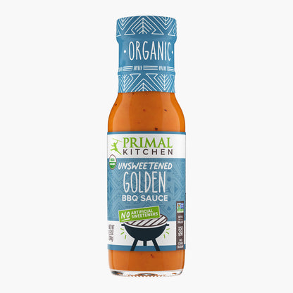 Primal Kitchen Organic Unsweetened Golden BBQ Sauce with no artificial sweeteners on a white background
